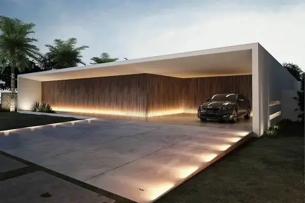 Fachadas de casas térreas com garagem na frente: garagem sem portão é proposta moderna