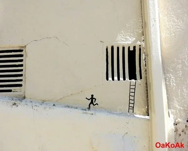 Intervenção Urbana: desenho de homem com escada na parede