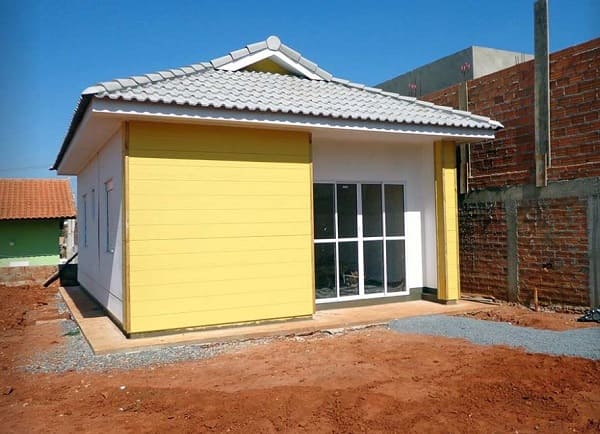 Wood Frame: casa em Itapeva com fachada amarela (fonte: Stamade)
