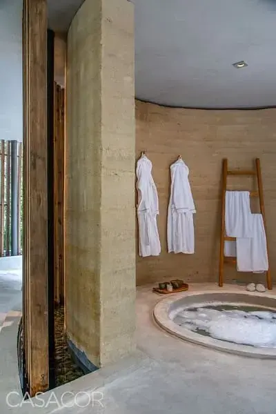 3. Taipa de Pilão: Projeto de banheiro com paredes curvas - espaço Deca na CASACOR (foto: Pinterest)