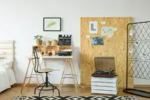 Room with desk and osb board