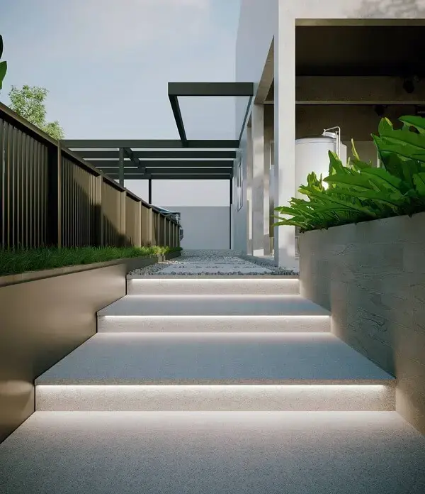 Crie um projeto luminotécnico e destaque o piso fulget durante a noite. Fonte: Vitral Arquitetura