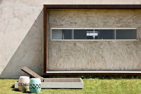 Casa de concreto com janela longa foto Gustavo Eduardo Sainz