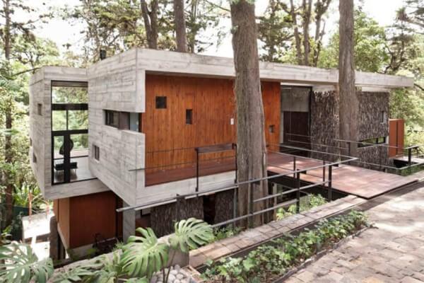 Casa de concreto com madeira foto Madereira Cedro Tatui